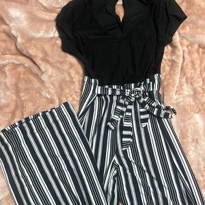 Long flare bottom black and white jumpsuit love this on